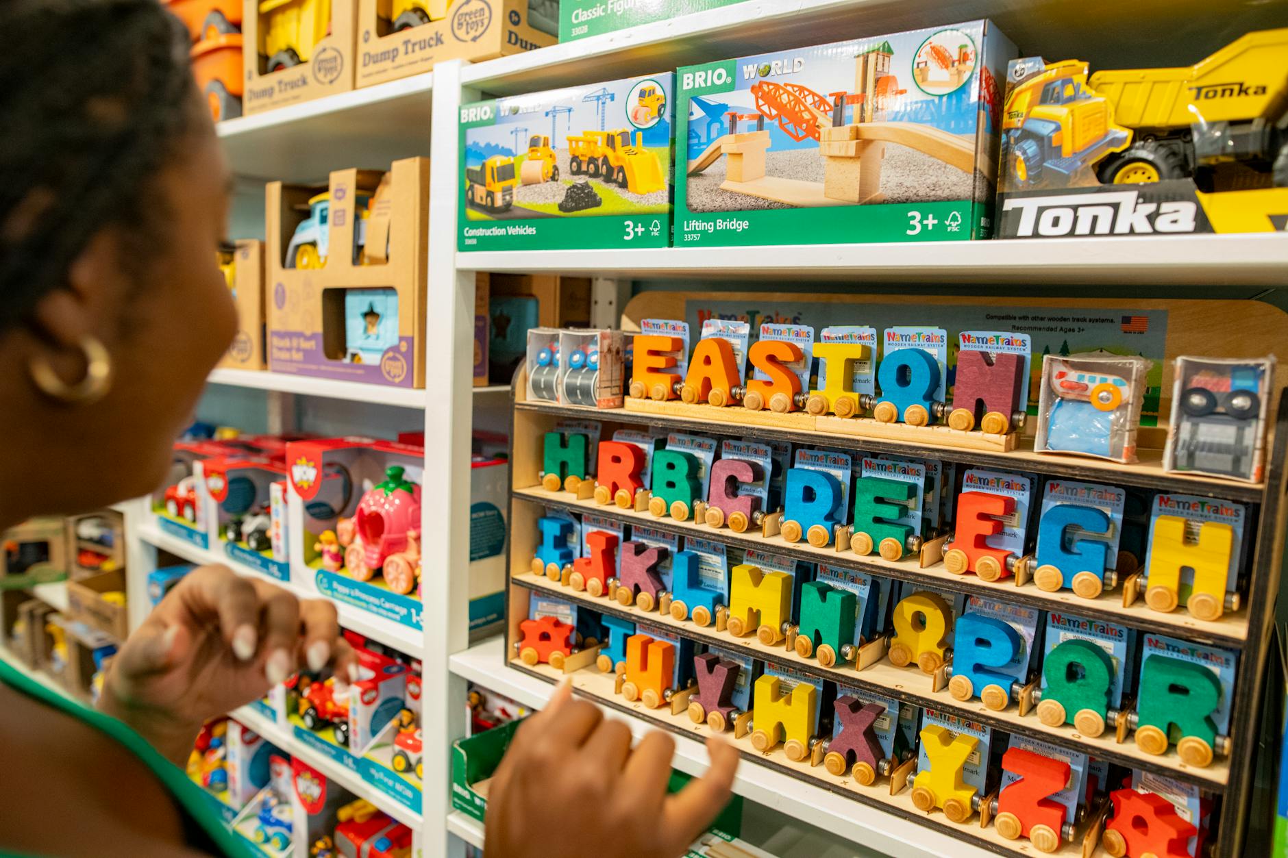 woman shopping for educational toys in store